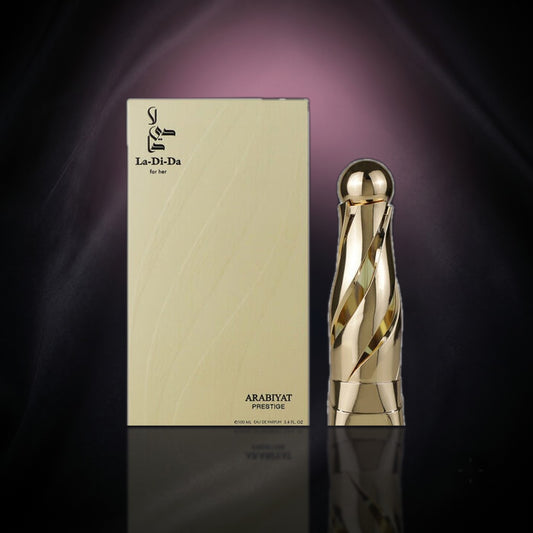 La Di Da — Arabiyat Prestige, frasco y caja (fondo oscuro)