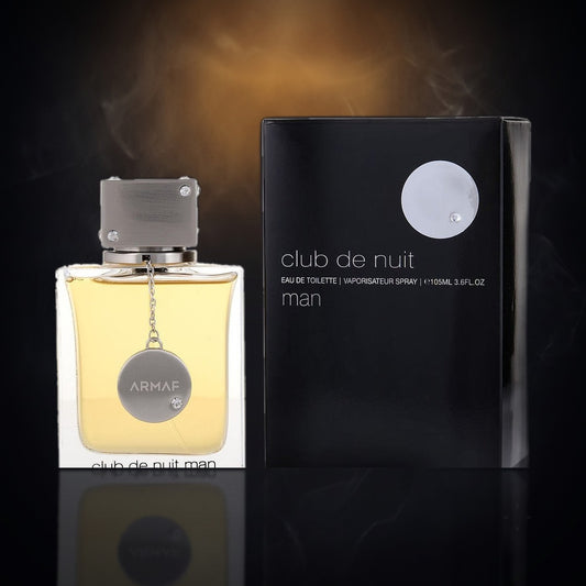 Club de Nuit Man — Armaf, frasco y caja (fondo oscuro)