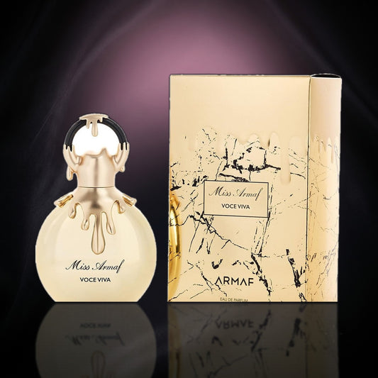 Miss Armaf Voce Viva — Armaf, frasco y caja (fondo oscuro)
